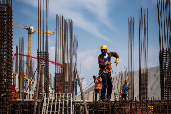 Nepalese workers working at a construction site