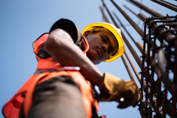 Nepalese workers working at a construction site