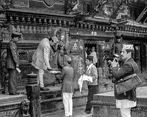 Late King Birendra receiving ‘Prasad’ at Taleju temple, Bhaktapur