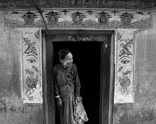 A local women of Bhaktapur peeking out