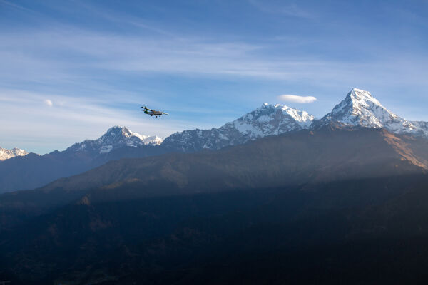 Aircraft passing through Mountains.
