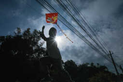 Child flying a kite during the Dashain festival in Nepal