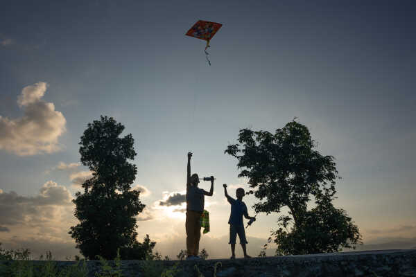 Kids Flying a Kite