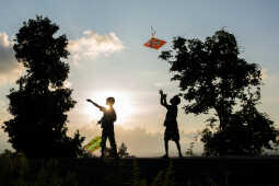 Kids Flying a Kite