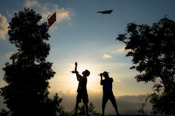 Kids Flying a Kite