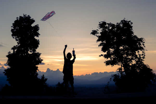 Kids Flying a Kite