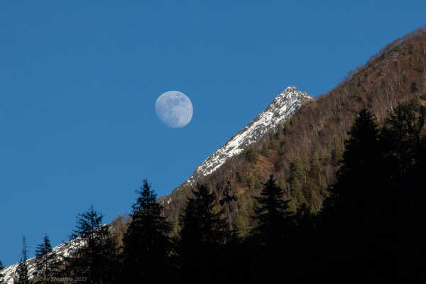 Himalayan peak with the Moon