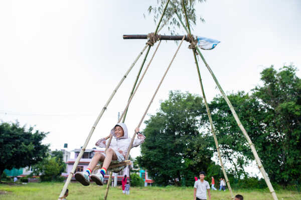 Kids playing Swing