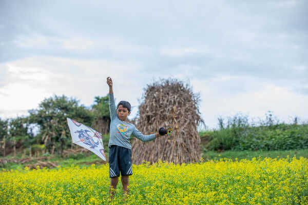 Kids Flying a Kite