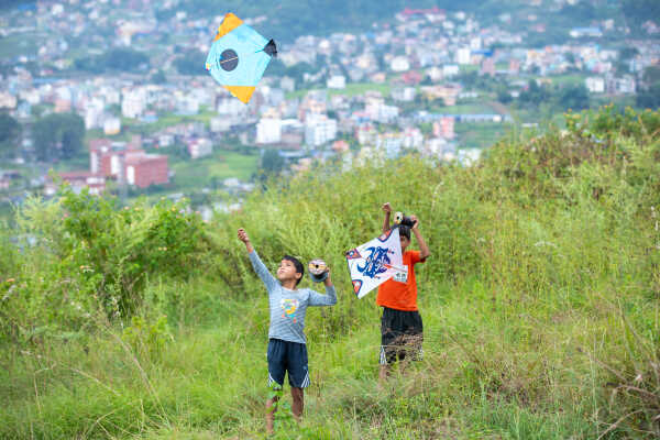 Kids Flying a Kite