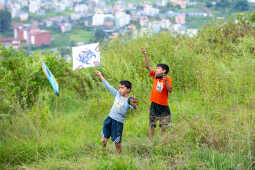 Kids Flying a Kite