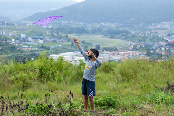 Kids Flying a Kite