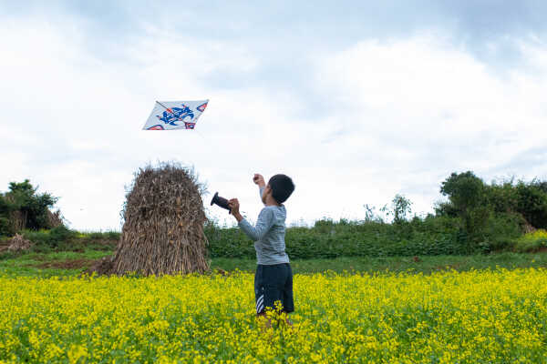 Kids Flying a Kite