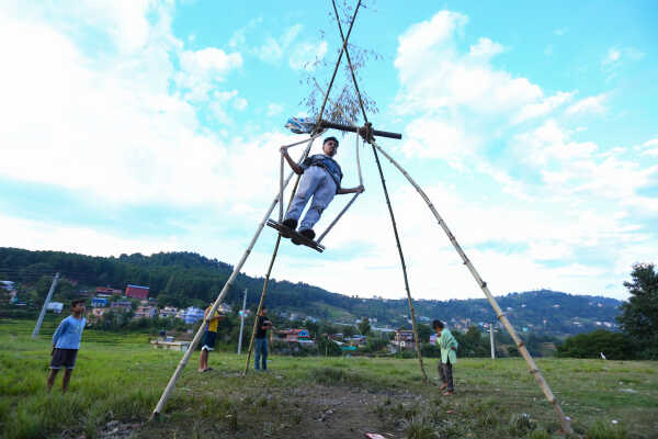 Nepalese Enjoying Linge Ping During the Dashain Festival 2082 in Bhaktapur