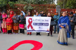 Maiti Nepal Lights Red Ribbon Candle Vigil on Eve of World AIDS Day