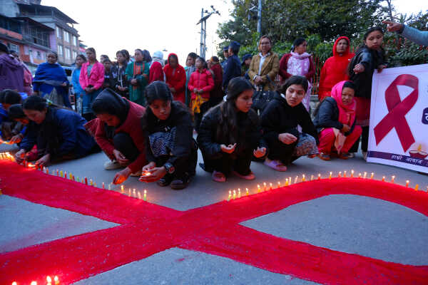 Maiti Nepal Lights Red Ribbon Candle Vigil on Eve of World AIDS Day