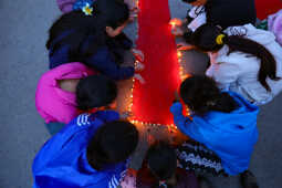 Maiti Nepal Lights Red Ribbon Candle Vigil on Eve of World AIDS Day