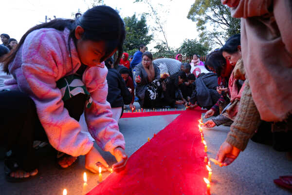 Maiti Nepal Lights Red Ribbon Candle Vigil on Eve of World AIDS Day