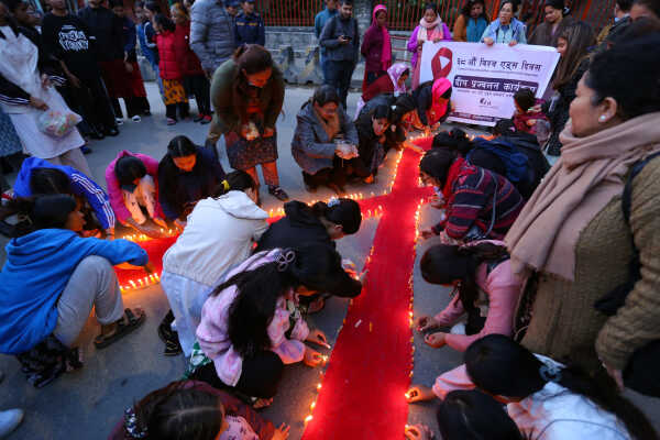 Maiti Nepal Lights Red Ribbon Candle Vigil on Eve of World AIDS Day
