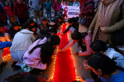 Maiti Nepal Lights Red Ribbon Candle Vigil on Eve of World AIDS Day