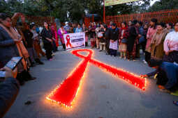 Maiti Nepal Lights Red Ribbon Candle Vigil on Eve of World AIDS Day