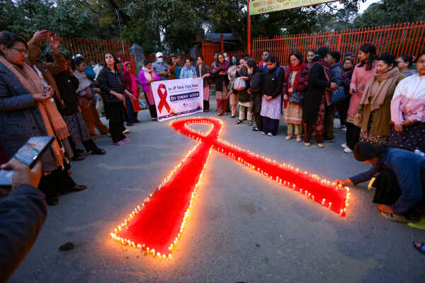 Maiti Nepal Lights Red Ribbon Candle Vigil on Eve of World AIDS Day