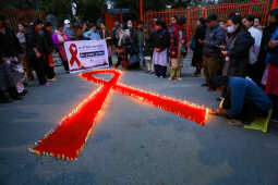 Maiti Nepal Lights Red Ribbon Candle Vigil on Eve of World AIDS Day