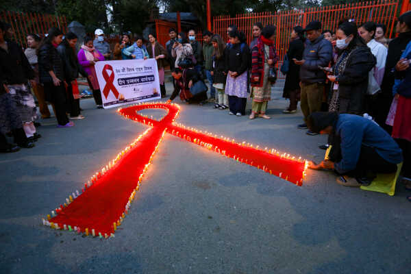 Maiti Nepal Lights Red Ribbon Candle Vigil on Eve of World AIDS Day
