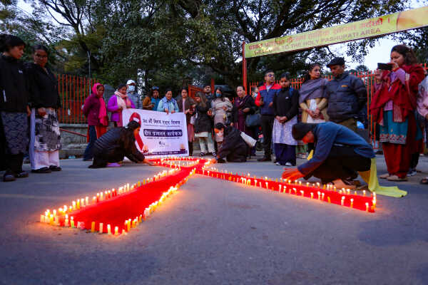 Maiti Nepal Lights Red Ribbon Candle Vigil on Eve of World AIDS Day