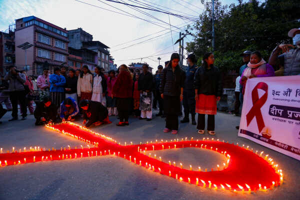 Maiti Nepal Lights Red Ribbon Candle Vigil on Eve of World AIDS Day