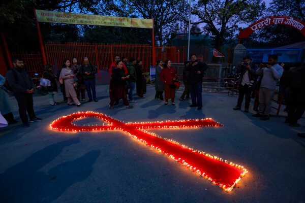 Maiti Nepal Lights Red Ribbon Candle Vigil on Eve of World AIDS Day
