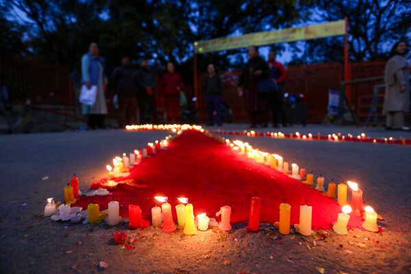 Maiti Nepal Lights Red Ribbon Candle Vigil on Eve of World AIDS Day
