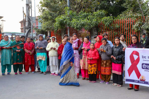 Maiti Nepal Lights Red Ribbon Candle Vigil on Eve of World AIDS Day