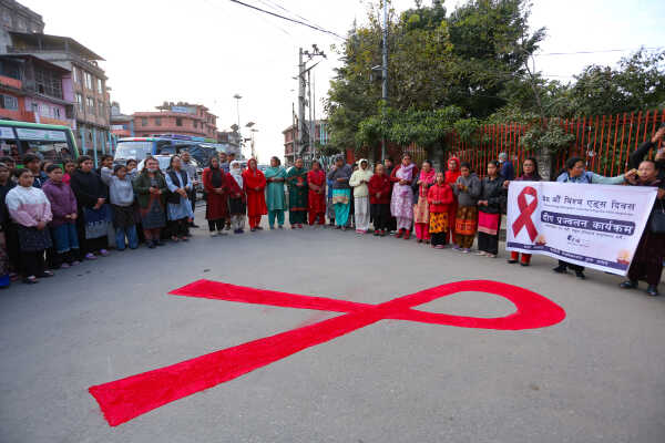 Maiti Nepal Lights Red Ribbon Candle Vigil on Eve of World AIDS Day