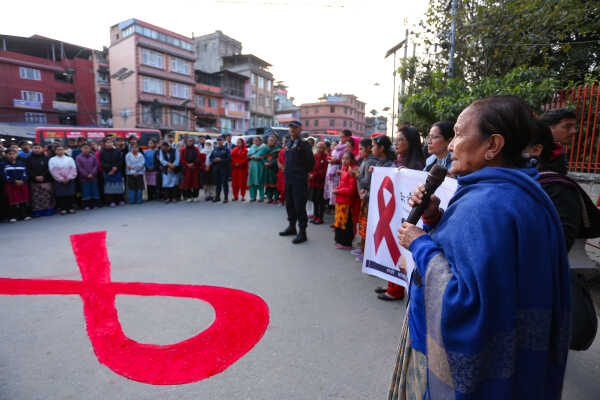 Maiti Nepal Lights Red Ribbon Candle Vigil on Eve of World AIDS Day