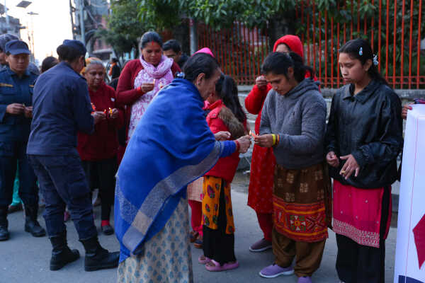 Maiti Nepal Lights Red Ribbon Candle Vigil on Eve of World AIDS Day