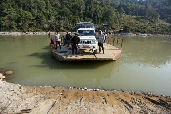 Ferry Service Used at Satighat Due to Lack of Permanent Bridge Over Arun River