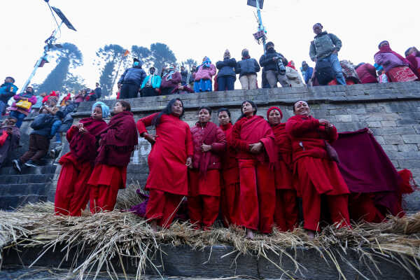 Madhav Narayan Vrat Devotees Take Holy Bath in Bagmati River at Pashupatinath