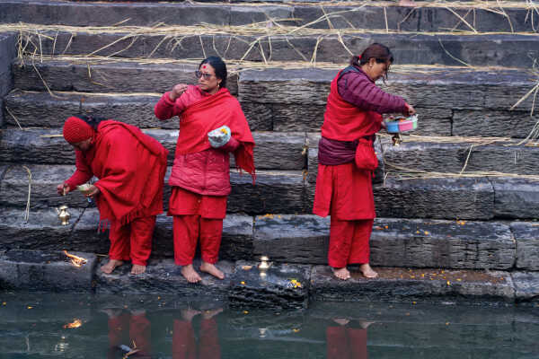 Madhav Narayan Vrat Devotees Take Holy Bath in Bagmati River at Pashupatinath