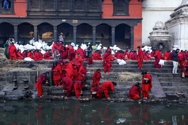 Madhav Narayan Vrat Devotees Take Holy Bath in Bagmati River at Pashupatinath