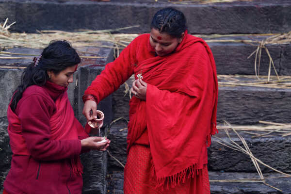 Madhav Narayan Vrat Devotees Take Holy Bath in Bagmati River at Pashupatinath