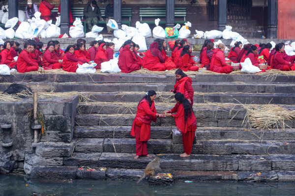 Madhav Narayan Vrat Devotees Take Holy Bath in Bagmati River at Pashupatinath