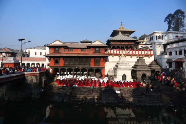 Madhav Narayan Vrat Devotees Take Holy Bath in Bagmati River at Pashupatinath