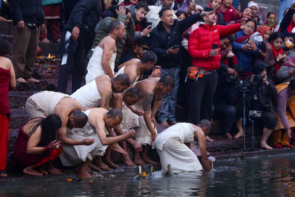Madhav Narayan Vrat Devotees Take Holy Bath in Bagmati River at Pashupatinath