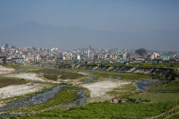 Daily Life in Nepal Farmers at Work Along the Manohara River (11)