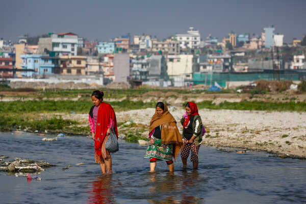Daily Life in Nepal Farmers at Work Along the Manohara River (6)