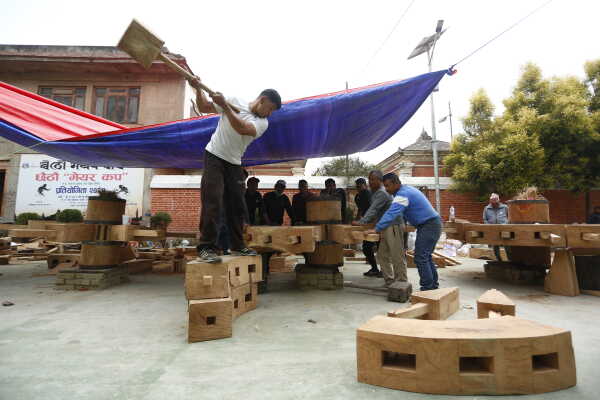 Daily Life in Nepal Reconstruction of Rato Machhindranath Chariot Wheel Underway