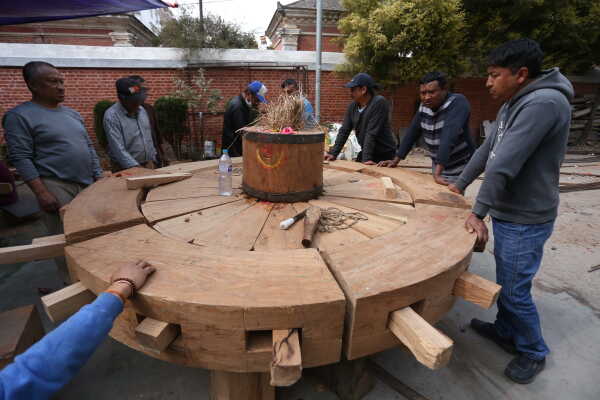 Daily Life in Nepal Reconstruction of Rato Machhindranath Chariot Wheel Underway