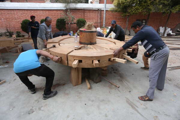 Daily Life in Nepal Reconstruction of Rato Machhindranath Chariot Wheel Underway