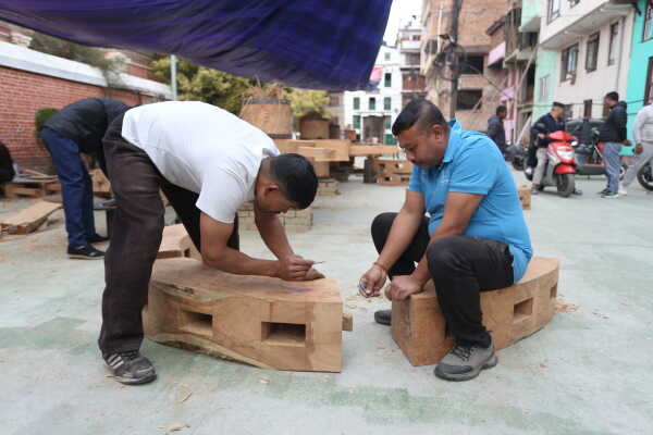 Daily Life in Nepal Reconstruction of Rato Machhindranath Chariot Wheel Underway